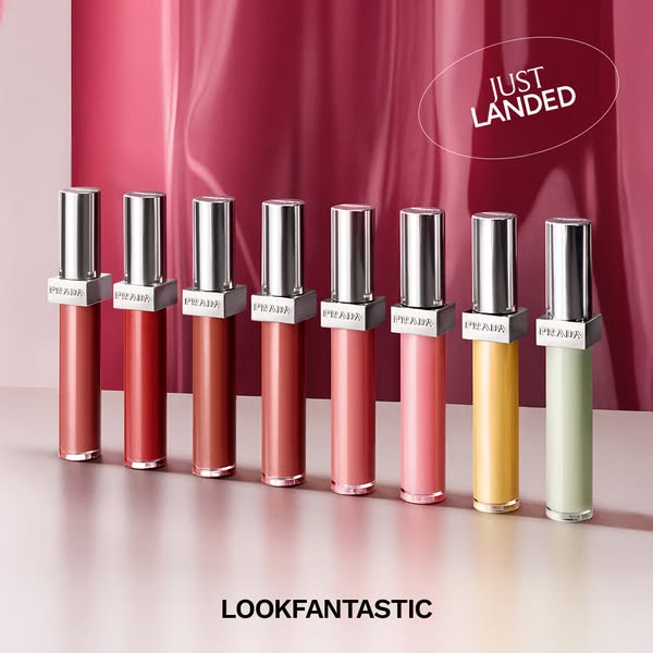 This ad for Prada Beauty showcases its new lip gloss products. The ad is visually driven, featuring a lineup of differen
