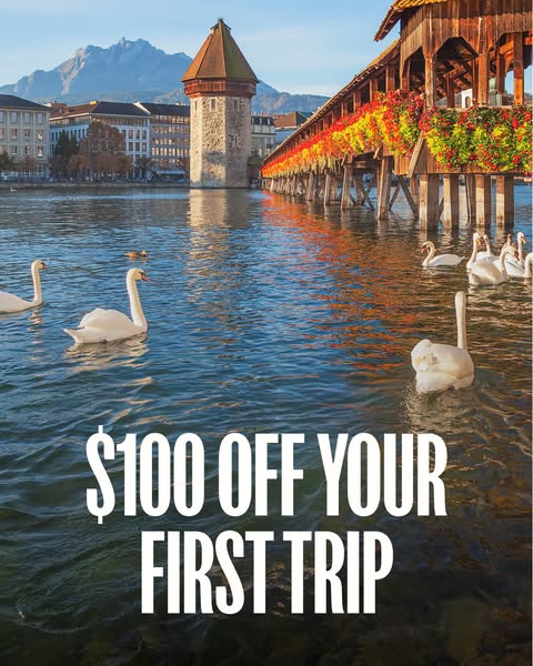 This image ad utilizes a wide shot of an idyllic lakeside European scene as the backdrop for a single promotional offer 