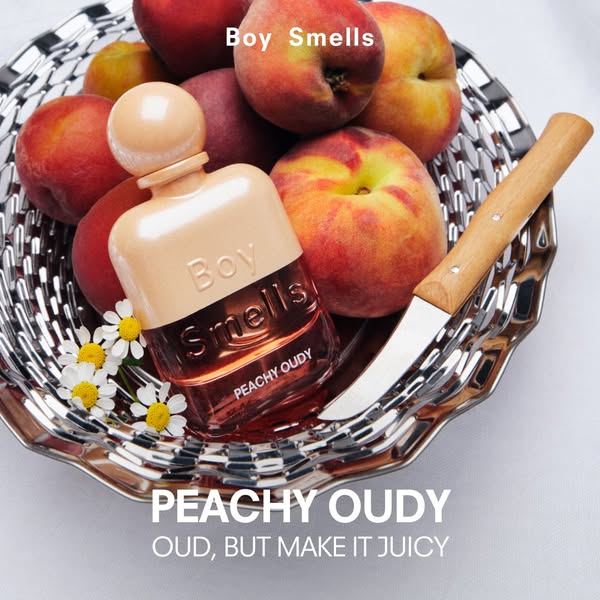 This image ad showcases Boy Smells' Peachy Oud fragrance. The ad features a bottle of the perfume in a decorative bo