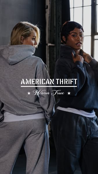 This ad features two models wearing matching sweat suits from American Thrift. The ad emphasizes the brand name and the 