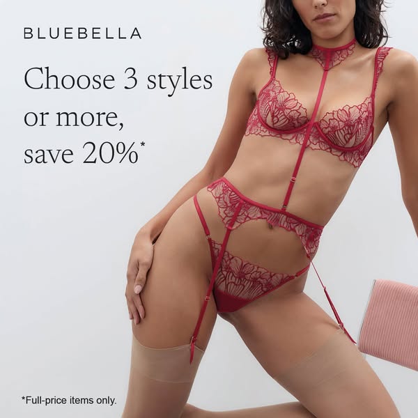 This image ad showcases a model wearing a red lingerie set from Bluebella. The ad encourages viewers to purchase three o