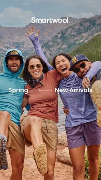 This image ad from Smartwool promotes their new spring arrivals. The ad features a group of diverse, smiling friends pos