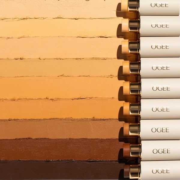 This ad showcases a range of Ogee Sculpted Face Sticks in various shades, demonstrating the product's color range an