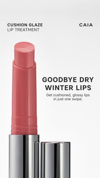 This ad promotes CAIA's Cushion Glaze Lip Treatment, highlighting its ability to provide cushioned, glossy lips in j
