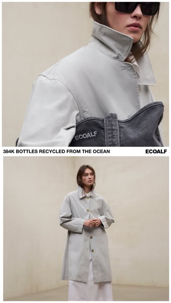 This image ad for Ecoalf features a woman wearing a gray jacket. The ad calls out the brand's commitment to sustaina
