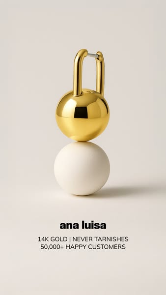 This ad showcases a gold earring from Ana Luisa against a neutral background, highlighting its 14K gold composition and 