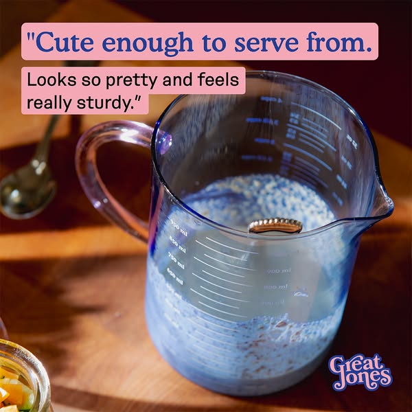 The ad promotes a glass measuring pitcher from Great Jones, emphasizing its aesthetic appeal and durability, while showc