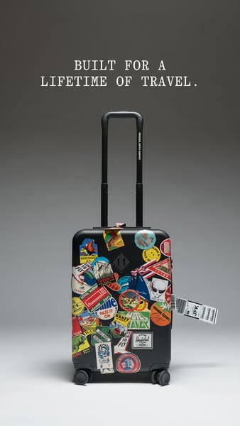 This ad showcases a suitcase with a variety of stickers on it.