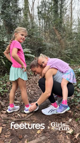 An outdoor image ad for Feetures brand socks with a photo of a mother and two young daughters on a wooded path. One of t
