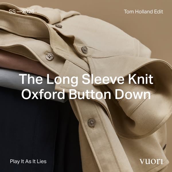 This ad showcases the Vuori Long Sleeve Knit Oxford Button Down in a close up flat lay shot.