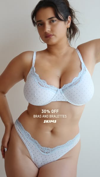 This image ad features a person wearing a matching bra and panty set. The text overlay states the promotion of 30% off b