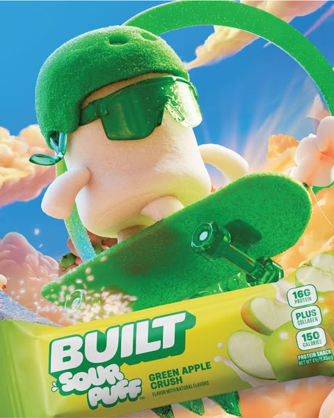 This image ad for Built Sour Puff protein bars features a cartoon marshmallow character with a helmet and goggles riding