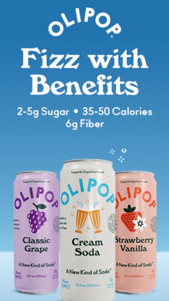 This ad features three cans of OLIPOP soda, each a different flavor: Classic Grape, Cream Soda, and Strawberry Vanilla. 
