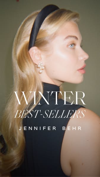 This image ad for Jennifer Behr features a woman wearing a black headband and pearl earrings. The ad promotes the brand&