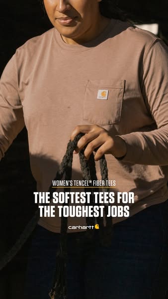 This ad showcases Carhartt's Women's Tencel Fiber Tees, emphasizing their softness and durability for tough jobs