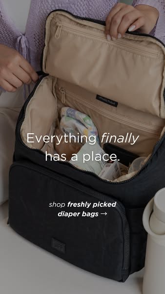 This ad features a parent packing a Freshly Picked diaper bag. The open bag shows how organized it is, and a caption hig