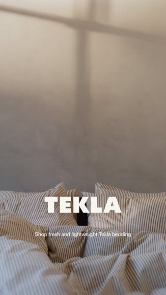 This ad is promoting TEKLA bedding. The background features a grey wall with window shade shadows, and the bed is covere