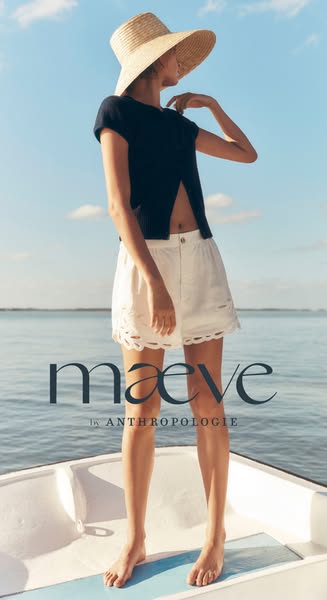 This image ad showcases clothing from Maeve by Anthropologie, featuring a model in a summer outfit with a hat on a boat,