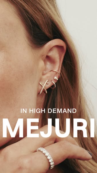 This ad for Mejuri focuses on the in-demand nature of the brand's jewelry. It showcases several earring styles as we