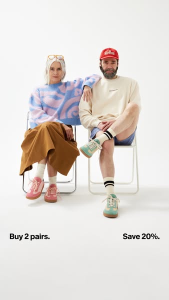 This image ad shows a man and woman wearing pairs of sneakers and socks. It offers 20% off when you buy 2 pairs.