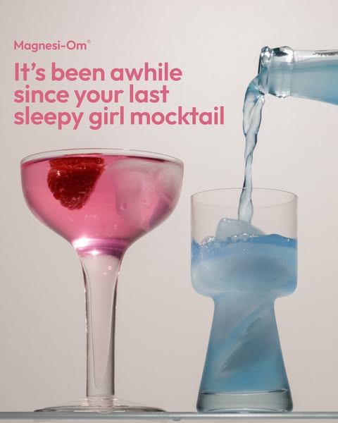 An ad for Magnesi-Om showing a blue drink being poured into a glass with ice, next to a glass of pink drink with a raspb