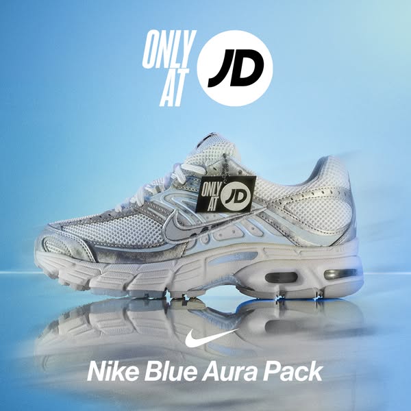 This ad showcases a pair of Nike Blue Aura Pack sneakers, emphasizing their availability exclusively at JD.