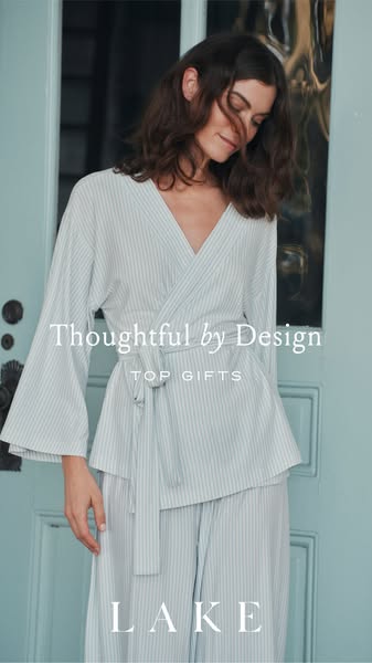 This ad features a woman wearing a light blue and white striped pajama set from LAKE, promoting it as a thoughtful gift.