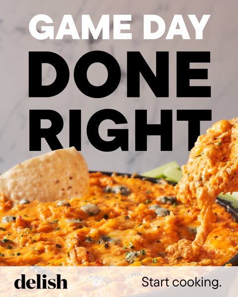 The ad features a close up shot of a buffalo chicken dip with a tortilla chip dipped in it, promoting a recipe by delish