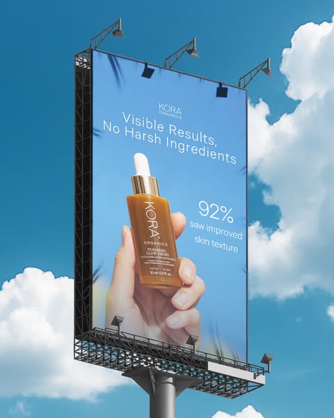This ad for Kora Organics Turmeric Glow Drops features a close-up of the product being held in someone's hand, with 