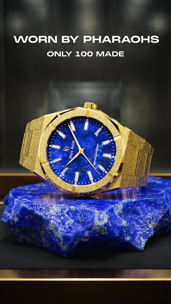 This image ad showcases a gold-colored Paul Rich watch with a blue face, emphasizing its luxurious and exclusive nature 