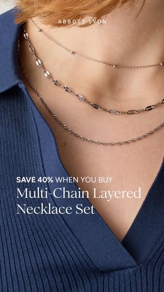 An elegant, vertically-oriented image ad promoting a multi-chain layered necklace set by Abbott Lyon, featuring a discou