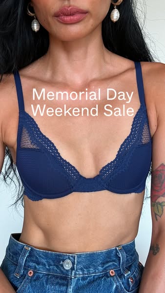 This ad is promoting a sale for Memorial Day Weekend and features a woman wearing a blue bra.