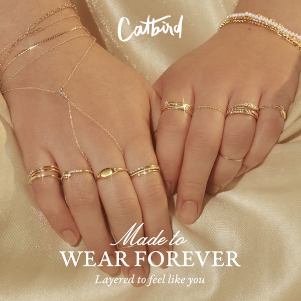 A product ad showcasing Catbird rings and jewelry, emphasizing a 'wear forever' and personalized style through l