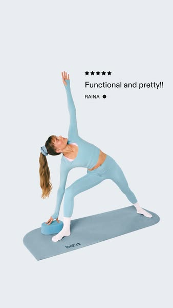 This image ad for baha promotes their yoga mats and blocks. The ad features a photo of a woman in activewear performing 