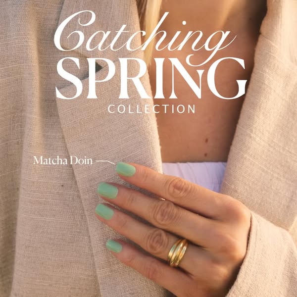 An image ad for a new nail polish collection by an unnamed brand. The ad features a hand with painted nails and jewelry,