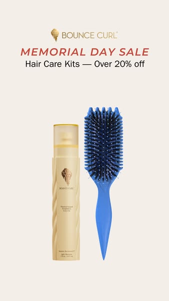 A static image ad promoting a Bounce Curl hair care kit sale. The ad features product and a brush against a neutral back