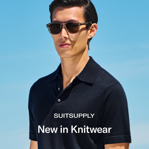 This ad by Suitsupply showcases its new knitwear collection, featuring a man in a navy polo shirt and sunglasses against