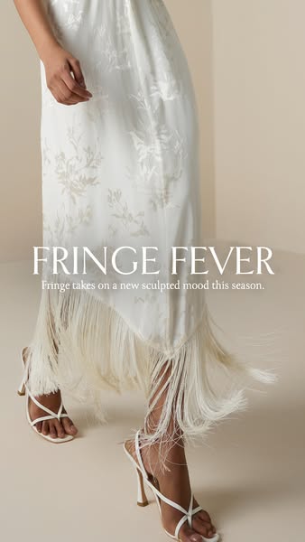 This image ad showcases a long white dress with fringe detailing and a subtle floral pattern. The headline emphasizes th