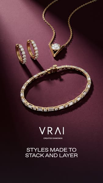 This image ad for VRAI features a selection of diamond jewelry, including a bracelet, earrings, and a necklace. The ad s