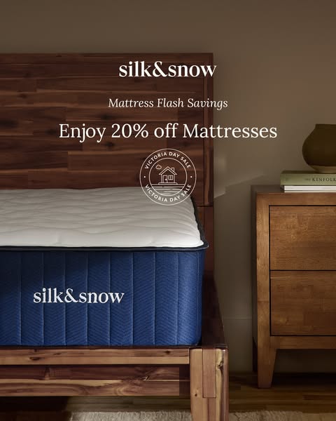 This image ad promotes a mattress sale from Silk & Snow for Victoria Day. It features a neatly made bed with a flash