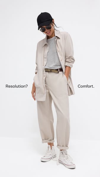 This ad features a woman wearing a casual outfit, with the text 'Resolution? Comfort.' on either side of her. Th