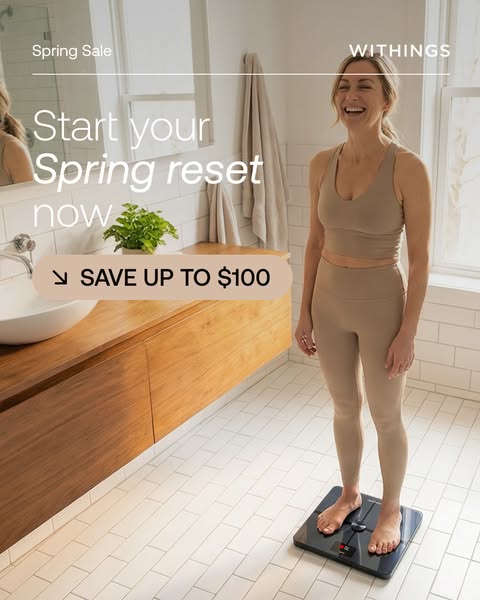 The ad features a woman standing on a Withings scale in a bathroom setting to promote a spring sale offering savings of 