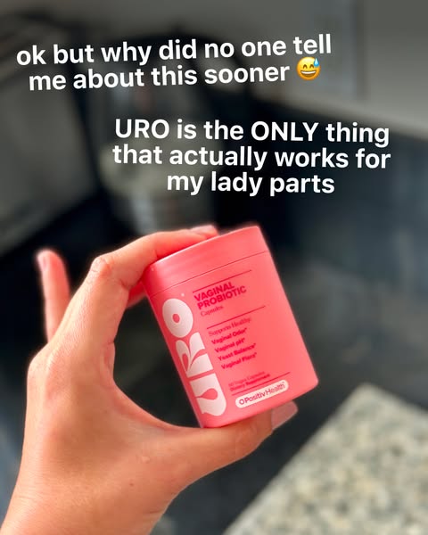 This ad features a woman holding a bottle of O Positiv Health URO Vaginal Probiotic Capsules. The ad highlights the prod