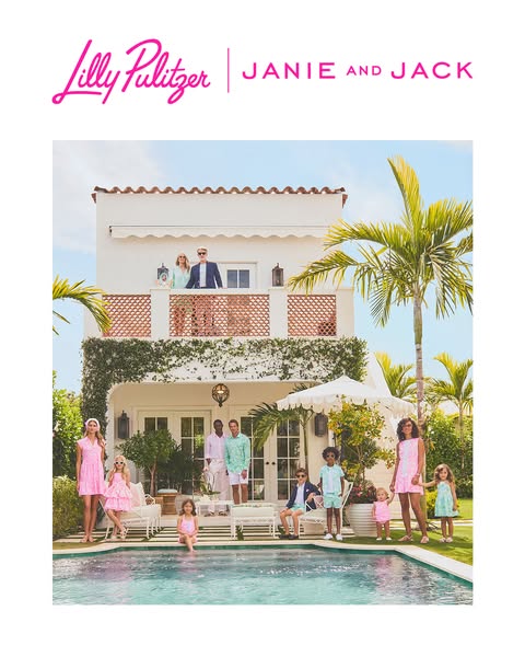 An image ad showcasing a large group of adults and children dressed in pink, blue and green clothing standing near and i