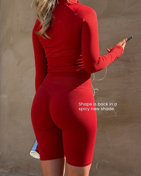 This ad features a woman from the back wearing a matching athleisure set in red. The ad shows a close-up of the athleisu