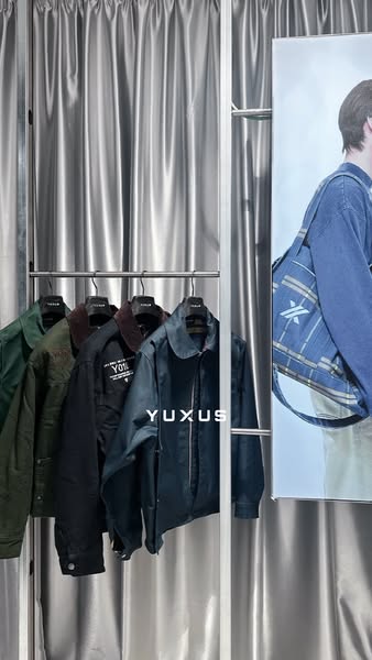 This ad showcases a variety of jackets from YUXUS.