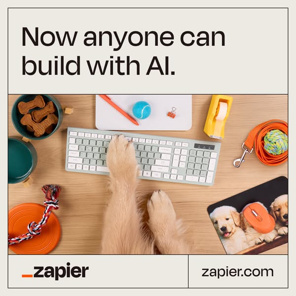 The ad shows a dog's paws on a computer keyboard to imply that now even dogs can build with AI with Zapier. The ad l