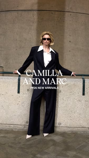 This ad features a blonde woman in a business suit and aims to showcase the brand and its new product arrivals.