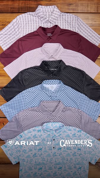 This ad showcases a collection of Ariat men's shirts available at Cavender's. The shirts are arranged on a woode