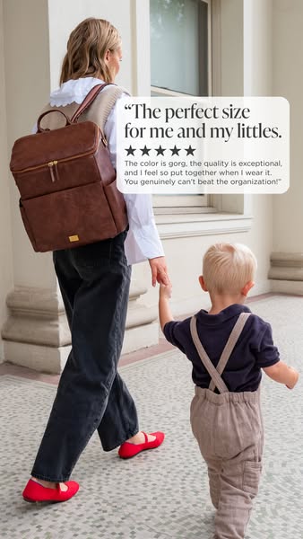 This ad features a testimonial for a diaper bag backpack. The ad shows a woman walking with her child, wearing the diape